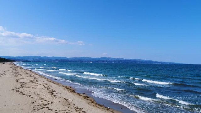 Aerial view of the Japanese sea and beach (60fps)