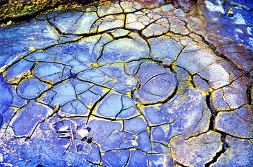 Parched, cracked earth that has been dried out by superheated water and volcanic gases in Lassen...