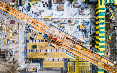 Construction Site Aerial View with Yellow Crane, Drone Point of View