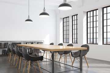 Corner of a conference room with many windows