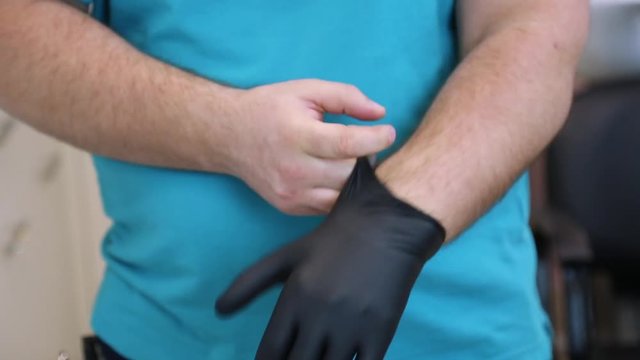 man wear black gloves