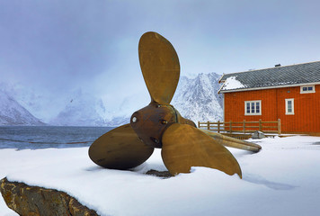 Ship propeller as a monument in the fishing village of Hamnoi, Lofoten Islands, Norway. © Unique Vision
