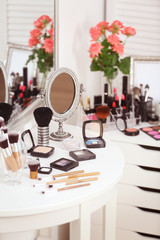Set of decorative cosmetics on table