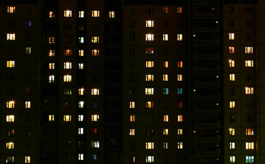 The light in the windows of an municipal building by night
