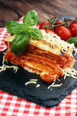 Serving of spicy traditional Italian beef lasagne in a restauran