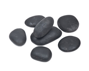 Super polished black river pebbles isolated on white background
