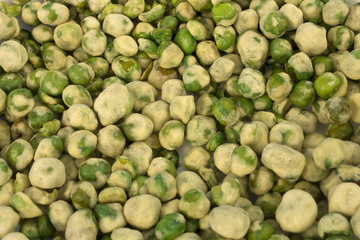 This is a photograph of spicy Wasabi Peas