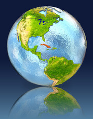 Cuba on globe with reflection
