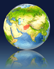 Afghanistan on globe with reflection