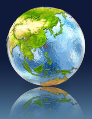 Taiwan on globe with reflection