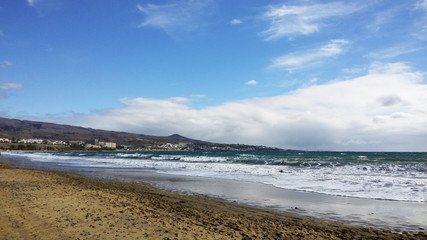 Fototapeta na wymiar Sea, sand and sky at Maspalomas, Spain