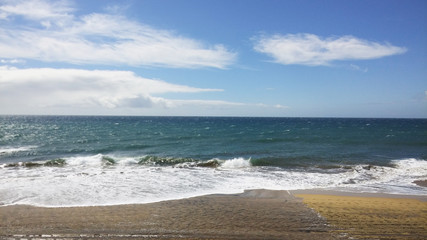 Fototapeta na wymiar Sea, sand and sky at Maspalomas, Spain