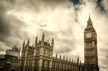 The Big Ben and Houses of Parliament in London, England, UK with dramatic cloudy sky