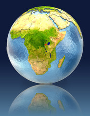 Rwanda on globe with reflection