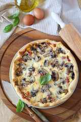 Mushrooms and lards pie. Top view