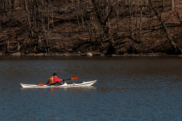 Man kayaking in a river