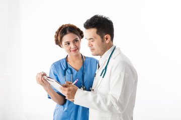 Fototapeta premium Asian male medical doctors and nurse with notebook on white background