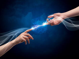 Hands connecting through fingers in space
