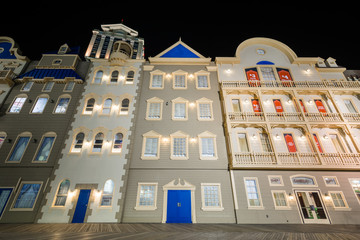 Buildings on the boardwalk at night, in Atlantic City, New Jersey. © jonbilous