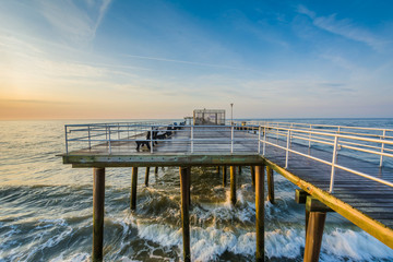 The fishing pier at sunrise in Ventnor City, New Jersey.