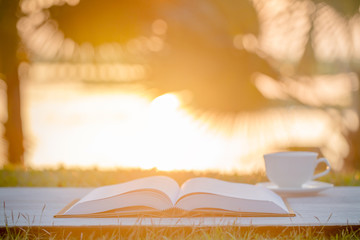 coffee cup and book in the morning