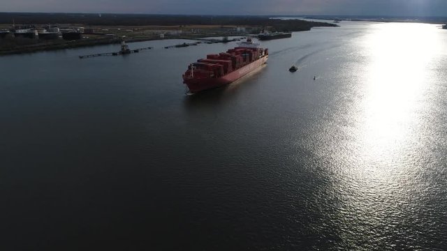 Aerial View of Container Ship and Tugboat Arriving Port of Philadelphia