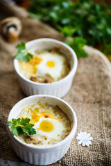Baked egg with minced fish and mushrooms
