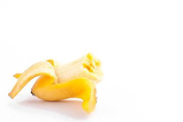 peeled egg banana with missing a bite on white background healthy Pisang Mas banana fruit food isolated
