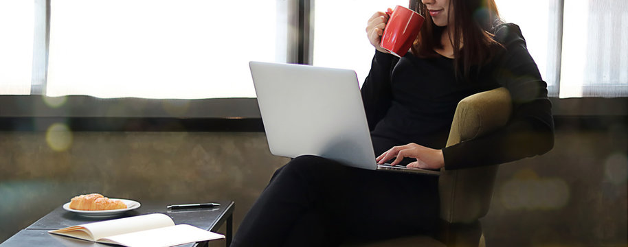 Young Woman Having A Cup Of Coffee Business Woman With Laptop Work And Chill