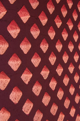 Brick block pink and light through hole.