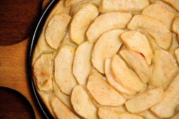 Apple pie on a plate. Close-up, top view