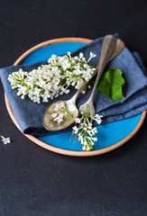 Spring table setting with white lilac