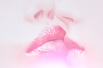 Gentle lips of two women in love. Homosexual couple. Lips with lipstick. Two girls closeup. Erotic couple