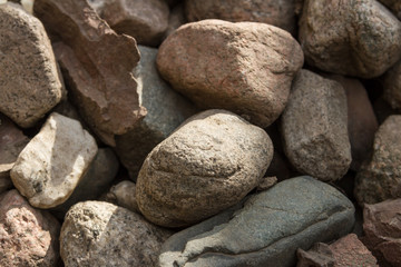 Many granite cobblestones for garden decoration