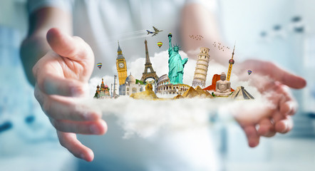 Businessman holding a cloud full of famous monuments in his hands 3D rendering