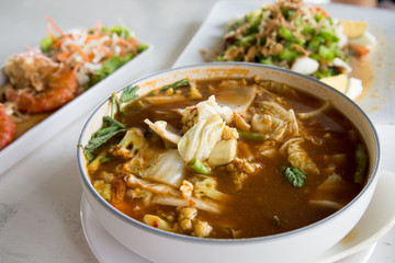 Sour soup made of Tamarind Paste with Canned fish and Mixed Vegetables