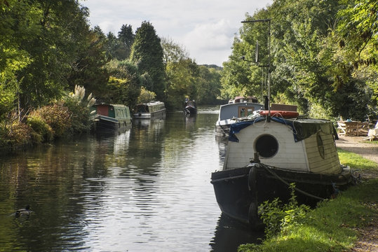 Canal barges on Grand Union Canal at Rickmansworth in Colne Valley Regional Park.