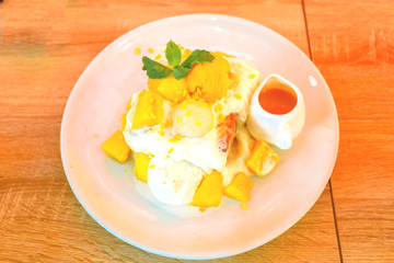 Bingsu ( Korea food) with mango on table