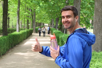 Successful male runner with earphones