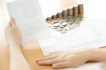 Fototapeta premium Stack of coins with Passbank
