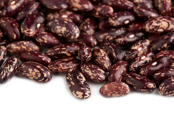 Dark Spotted kidney bean isolated on white background. Dark kidney bean texture background. A large bean with a subtle sweet flavor and soft texture. Beans. Proper nutrition. Vitamins. Healthy food.