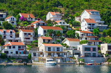 Fototapeta na wymiar View from sea on coast, Kotor Bay, Montenegro