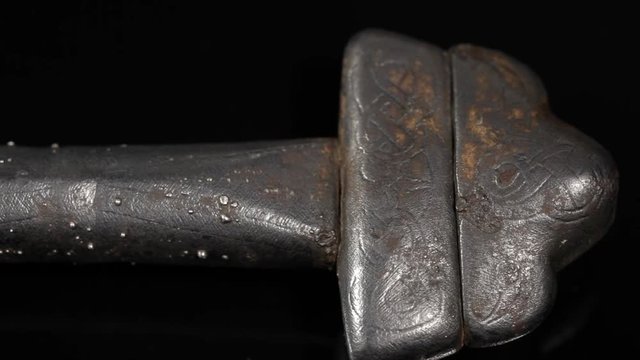 Original ancient Viking sword from 11th century. Hilt with exceptional silver engravings.