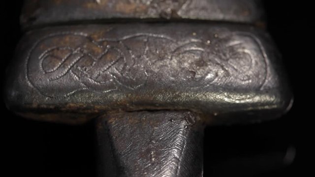 Original ancient Viking sword from 11th century. Hilt with exceptional silver engravings.