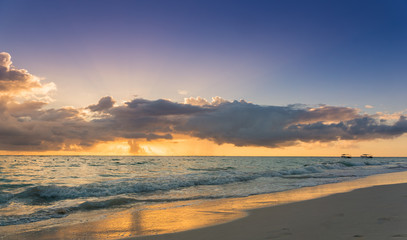 Fototapeta na wymiar Colorful ocean beach sunrise - Tropical Beach
