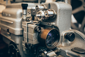 vintage metal film projector with lens