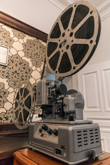 Obraz premium Vintage metal movie projector with film reel