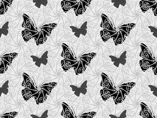 Beautiful seamless background of butterflies black and white colors.