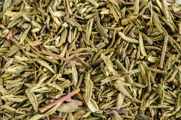 Dry thyme leaves. Food background.