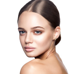 Obraz premium Calm beauty. Portrait of beautiful young blonde woman with nude makeup, blue eyes, hairstyle and clean face. Studio shot, Isolated on white background.